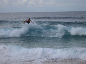 Jumping Surfer at Sunset Beach, Oahu, Hawaii