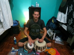 Dennis Kopp practicing Tabla in a Dorm while Travelling