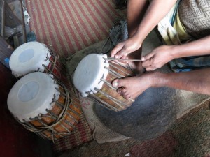 Stretching of wet Skin on wooden Tabla