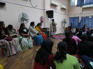 Guests on Chairs and Students on the Floor