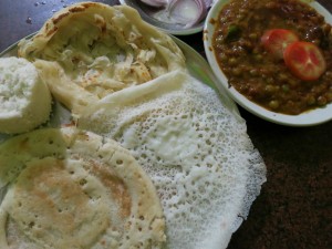 Appam, Puttu, Parotta and Dosa with Curry