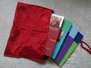 Carrying only wrapped Dharma Books