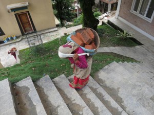 Women carrying heavy Loads at Kopan