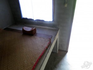 Concrete Bed and Wood Pillow during Vipassana at Wat Suan Mokkh, Thailand