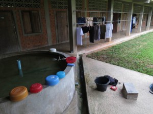 Washing with the Bucket only in Underwear, Wat Suan Mokkh