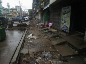 Dirty Ankle Trap Sidewalks in Yangon, Myanmar