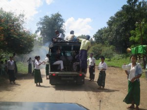 People collecting Money on the way to Mount Popa, Myanmar