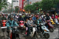 SeeTheWorldInMyEyes - Many Scooters on the Streets of Hanoi in Vietnam