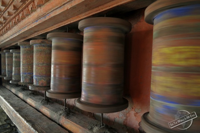 FIRE - Spinning Buddhist Prayer Wheels in the Himalayan Mountains of Nepal - seetheworldinmyeyes.com